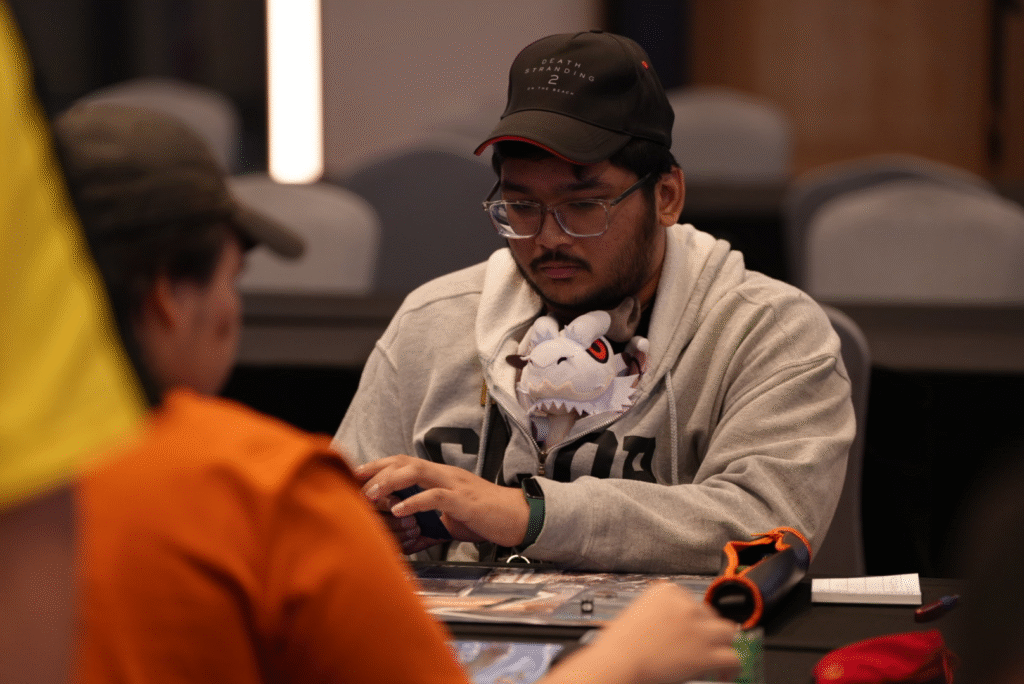 A photo of Kiran Ganesan competing in the 2025 World Championship Qualifier for the card game Flesh and Blood